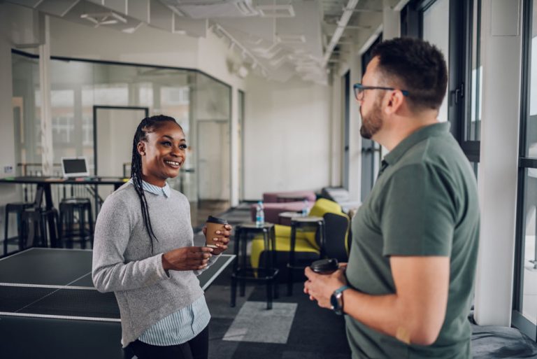 multiracial-colleagues-talking-